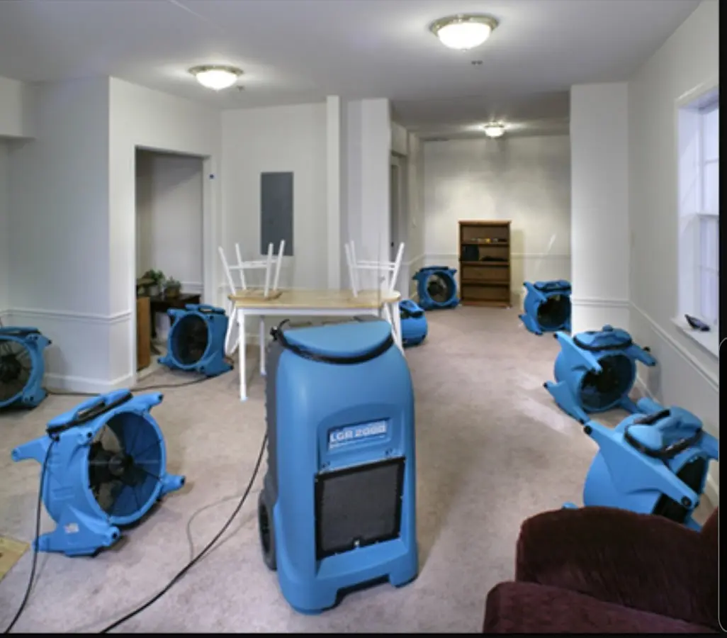 Air movers and dehumidifier setup for Water Damage Restoration in Reading
